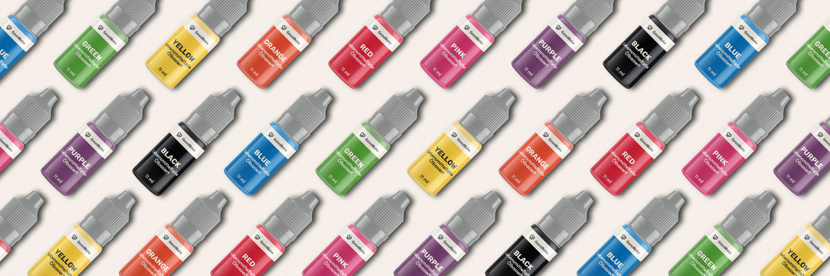 Ölbasierte Lebensmittelfarben von GoodBake in Schwarz, Blau, Rot, Pink, Gelb, Orange, Grün und Lila